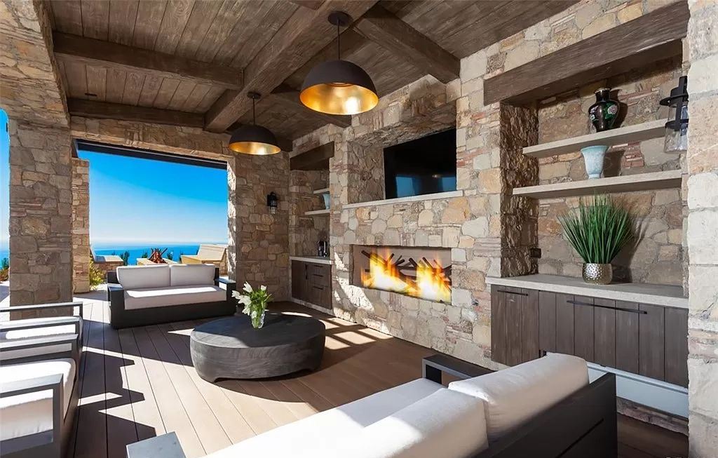 The Home in Newport is an unique property showcases sweeping unobstructed ocean views, superior construction, and meticulous detail now available for sale. This home located at 46 Deep Sea, Newport Coast, California