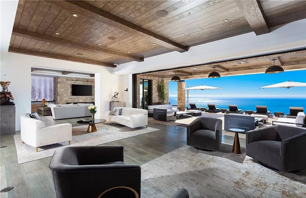 The Home in Newport is an unique property showcases sweeping unobstructed ocean views, superior construction, and meticulous detail now available for sale. This home located at 46 Deep Sea, Newport Coast, California