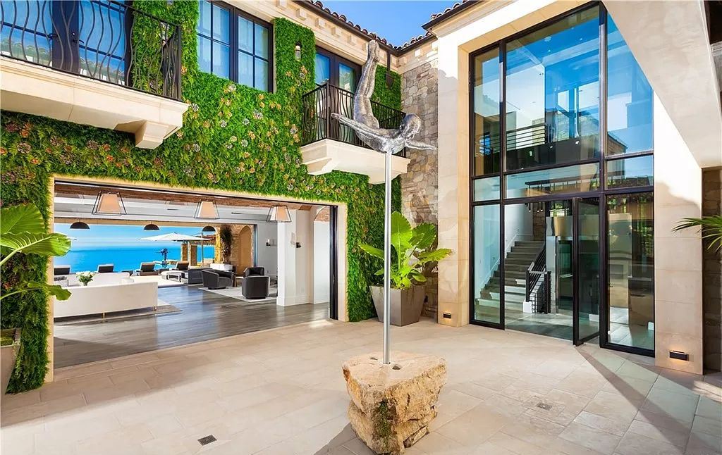 The Home in Newport is an unique property showcases sweeping unobstructed ocean views, superior construction, and meticulous detail now available for sale. This home located at 46 Deep Sea, Newport Coast, California