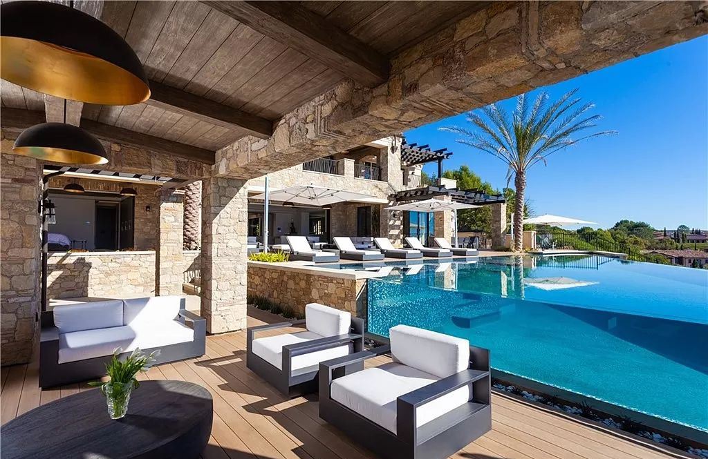 The Home in Newport is an unique property showcases sweeping unobstructed ocean views, superior construction, and meticulous detail now available for sale. This home located at 46 Deep Sea, Newport Coast, California