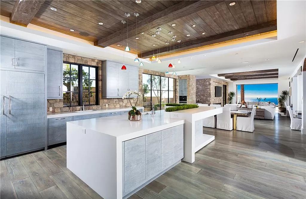 The Home in Newport is an unique property showcases sweeping unobstructed ocean views, superior construction, and meticulous detail now available for sale. This home located at 46 Deep Sea, Newport Coast, California