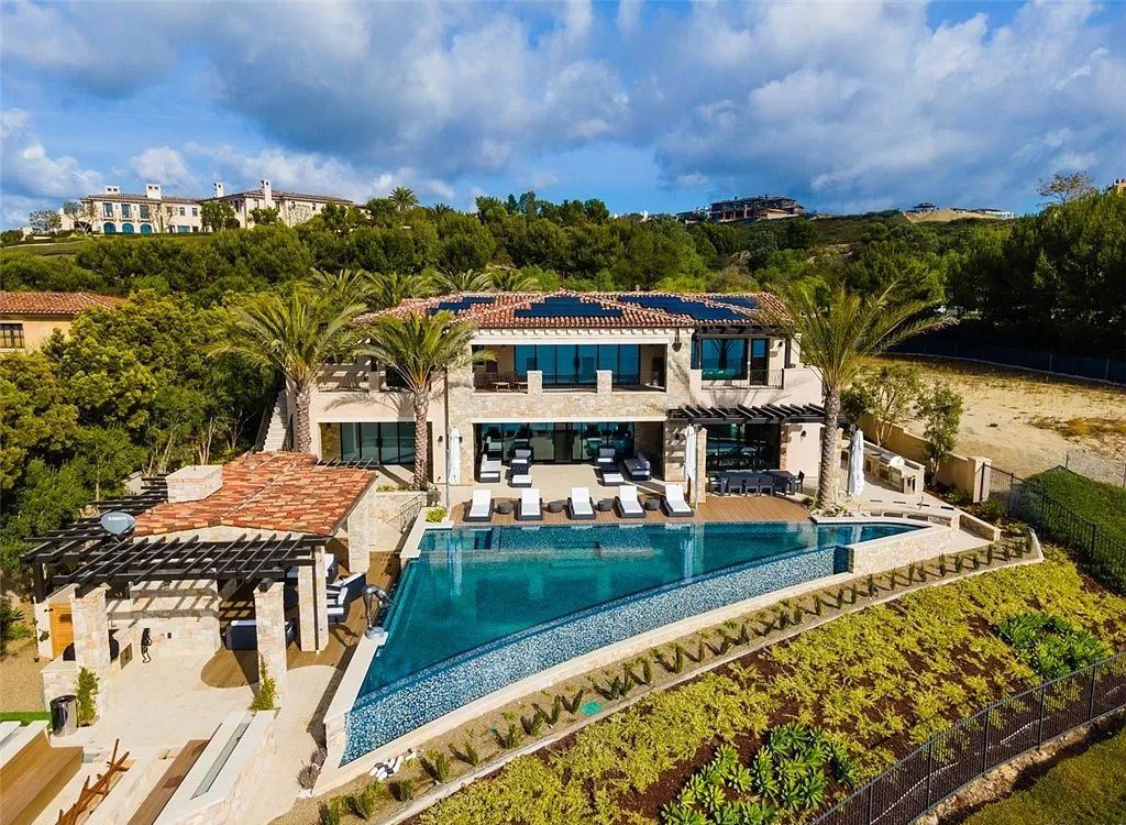 The Home in Newport is an unique property showcases sweeping unobstructed ocean views, superior construction, and meticulous detail now available for sale. This home located at 46 Deep Sea, Newport Coast, California