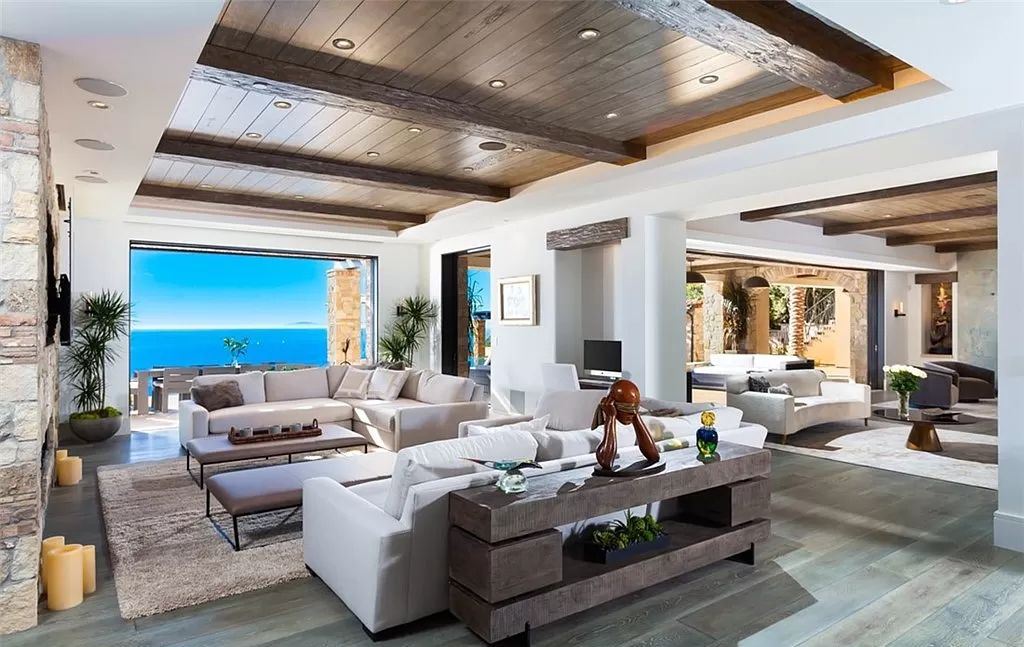 The Home in Newport is an unique property showcases sweeping unobstructed ocean views, superior construction, and meticulous detail now available for sale. This home located at 46 Deep Sea, Newport Coast, California