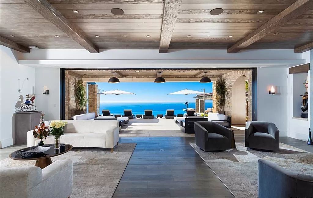 The Home in Newport is an unique property showcases sweeping unobstructed ocean views, superior construction, and meticulous detail now available for sale. This home located at 46 Deep Sea, Newport Coast, California