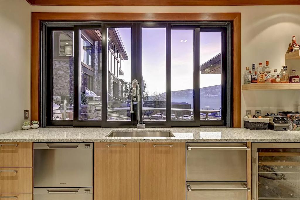 The Home in Kelowna is truly beyond compare complimented by a home gym, his and hers closets & ensuite, inviting relaxation room, now available for sale