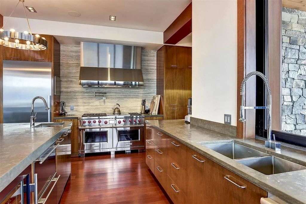 The Home in Kelowna is truly beyond compare complimented by a home gym, his and hers closets & ensuite, inviting relaxation room, now available for sale