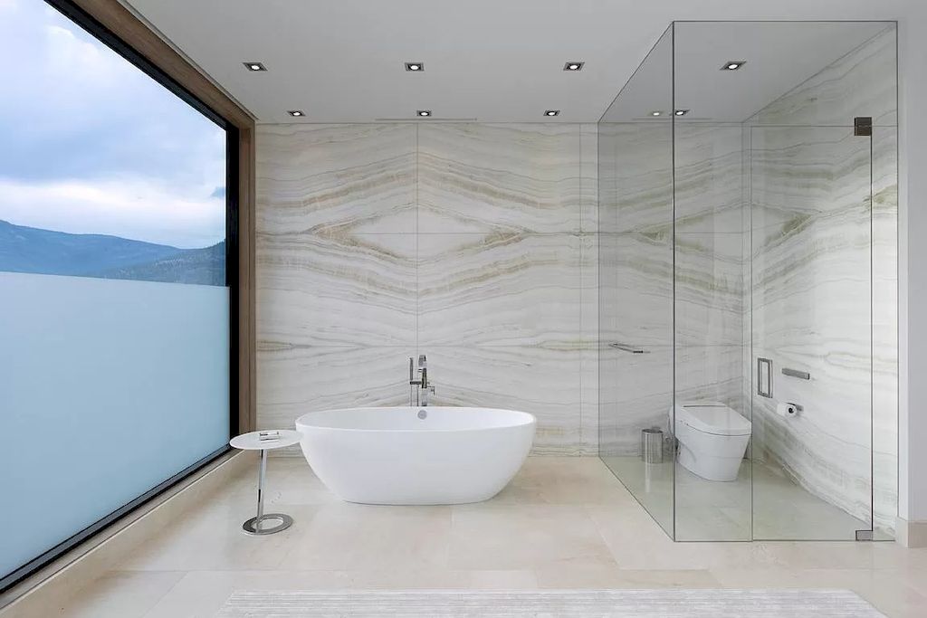 The Home in Kelowna is truly beyond compare complimented by a home gym, his and hers closets & ensuite, inviting relaxation room, now available for sale