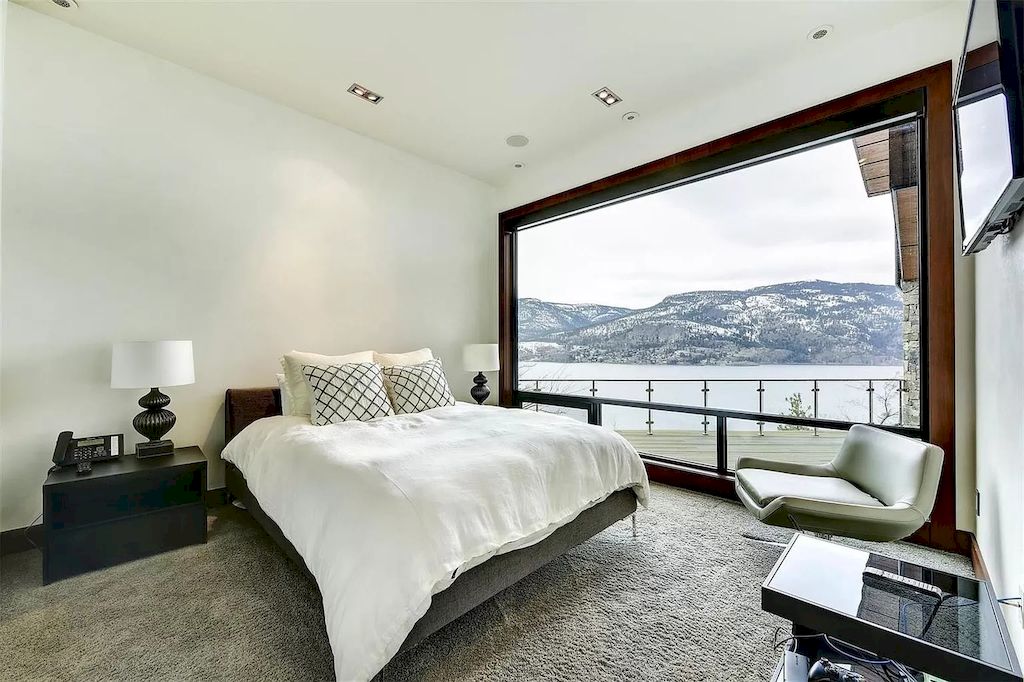 The Home in Kelowna is truly beyond compare complimented by a home gym, his and hers closets & ensuite, inviting relaxation room, now available for sale