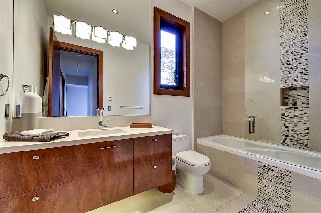 The Home in Kelowna is truly beyond compare complimented by a home gym, his and hers closets & ensuite, inviting relaxation room, now available for sale