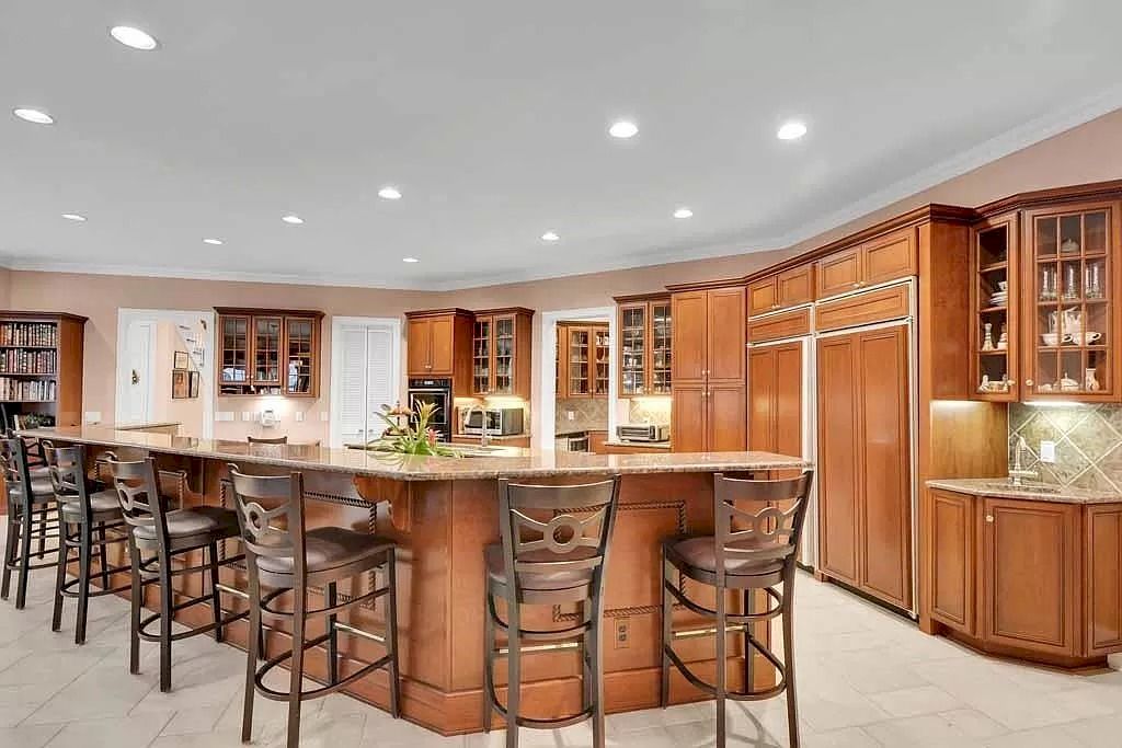 The Home in Georgia is a luxurious home offering impressive foyer, gracious living room and spacious dining room now available for sale. This home located at 23 Carriage Dr, Saint Simons Island, Georgia; offering 07 bedrooms and 08 bathrooms with 10,688 square feet of living spaces.