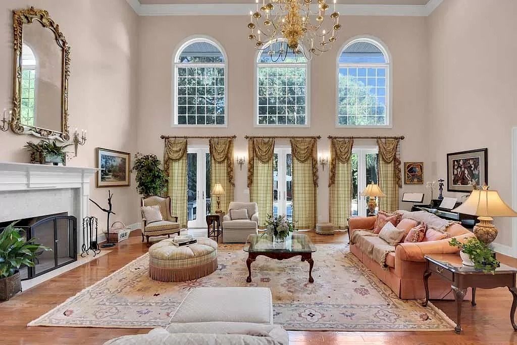 The Home in Georgia is a luxurious home offering impressive foyer, gracious living room and spacious dining room now available for sale. This home located at 23 Carriage Dr, Saint Simons Island, Georgia; offering 07 bedrooms and 08 bathrooms with 10,688 square feet of living spaces.