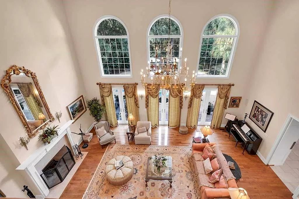 The Home in Georgia is a luxurious home offering impressive foyer, gracious living room and spacious dining room now available for sale. This home located at 23 Carriage Dr, Saint Simons Island, Georgia; offering 07 bedrooms and 08 bathrooms with 10,688 square feet of living spaces.