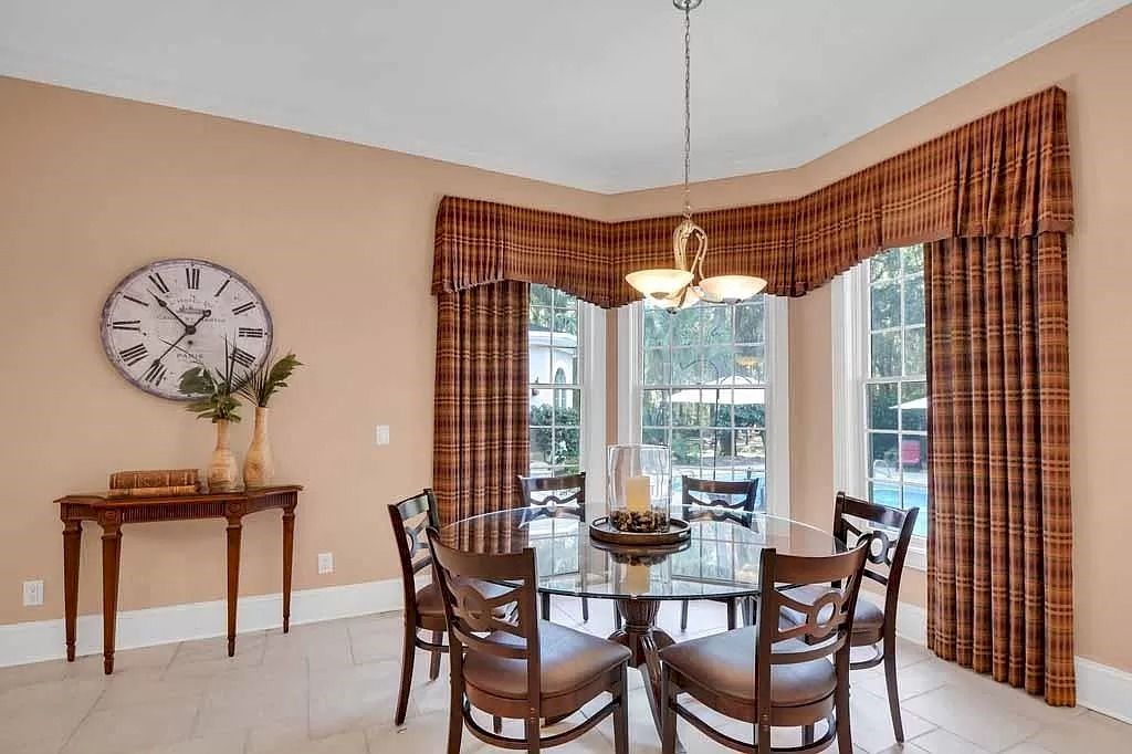 The Home in Georgia is a luxurious home offering impressive foyer, gracious living room and spacious dining room now available for sale. This home located at 23 Carriage Dr, Saint Simons Island, Georgia; offering 07 bedrooms and 08 bathrooms with 10,688 square feet of living spaces.