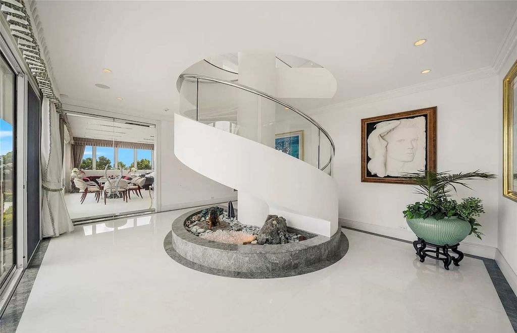 The Home in Hawaii is a luxurious home offering unprecedented privacy combined with sophisticated, cosmopolitan lifestyle now available for sale. This home located at 828 Moaniala St, Honolulu, Hawaii; offering 05 bedrooms and 09 bathrooms with 8,424 square feet of living spaces.