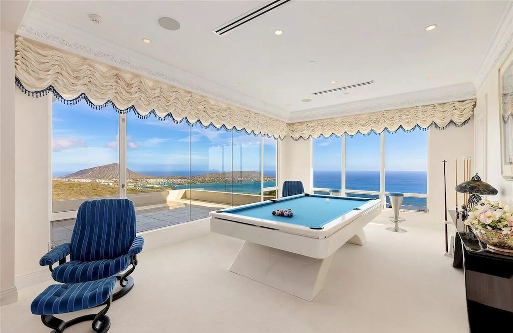 The Home in Hawaii is a luxurious home offering unprecedented privacy combined with sophisticated, cosmopolitan lifestyle now available for sale. This home located at 828 Moaniala St, Honolulu, Hawaii; offering 05 bedrooms and 09 bathrooms with 8,424 square feet of living spaces.