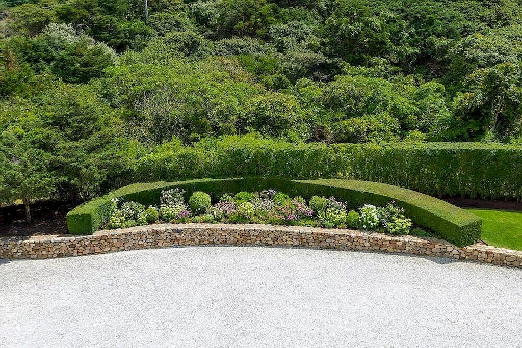The Home in Massachusetts is a luxurious home concealed by mature and thoughtfully designed gardens now available for sale. This home located at 1 Shawkemo Hills Ln, Nantucket, MA 02554, Massachusetts; offering 06 bedrooms and 09 bathrooms with 8,139 square feet of living spaces.