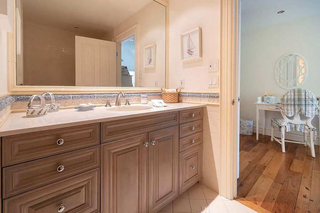The Home in Massachusetts is a luxurious home concealed by mature and thoughtfully designed gardens now available for sale. This home located at 1 Shawkemo Hills Ln, Nantucket, MA 02554, Massachusetts; offering 06 bedrooms and 09 bathrooms with 8,139 square feet of living spaces.