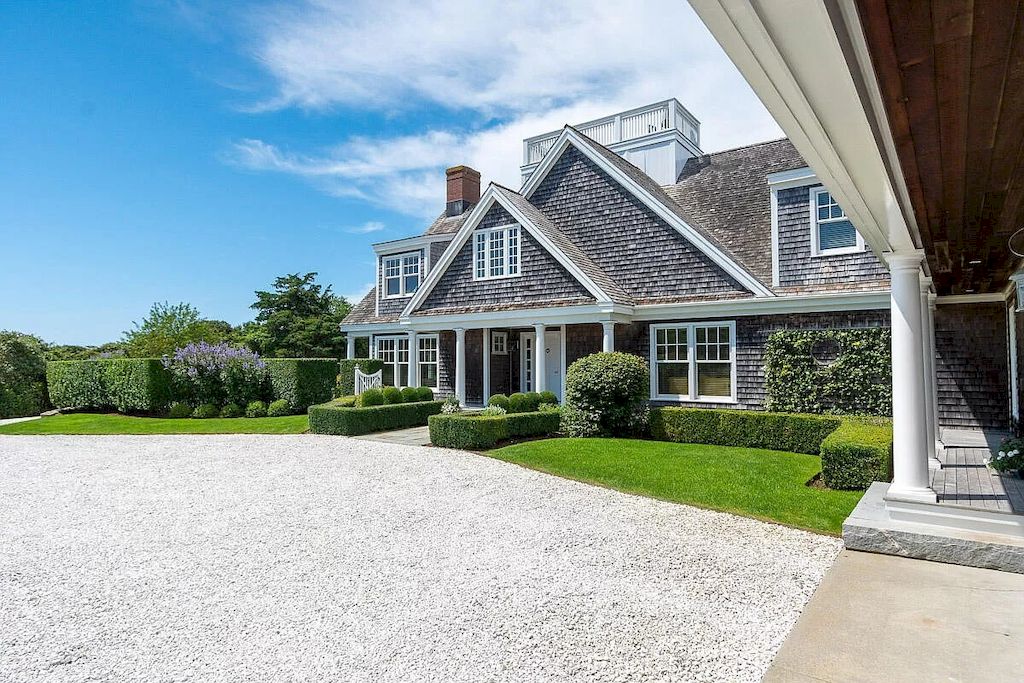 The Home in Massachusetts is a luxurious home concealed by mature and thoughtfully designed gardens now available for sale. This home located at 1 Shawkemo Hills Ln, Nantucket, MA 02554, Massachusetts; offering 06 bedrooms and 09 bathrooms with 8,139 square feet of living spaces.