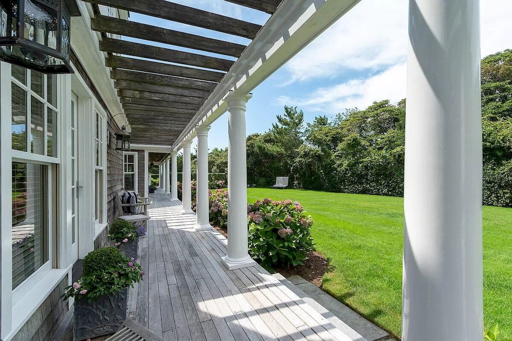 The Home in Massachusetts is a luxurious home concealed by mature and thoughtfully designed gardens now available for sale. This home located at 1 Shawkemo Hills Ln, Nantucket, MA 02554, Massachusetts; offering 06 bedrooms and 09 bathrooms with 8,139 square feet of living spaces.