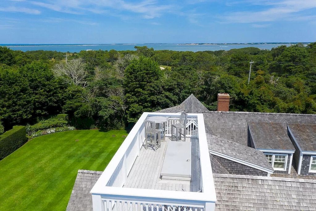 The Home in Massachusetts is a luxurious home concealed by mature and thoughtfully designed gardens now available for sale. This home located at 1 Shawkemo Hills Ln, Nantucket, MA 02554, Massachusetts; offering 06 bedrooms and 09 bathrooms with 8,139 square feet of living spaces.