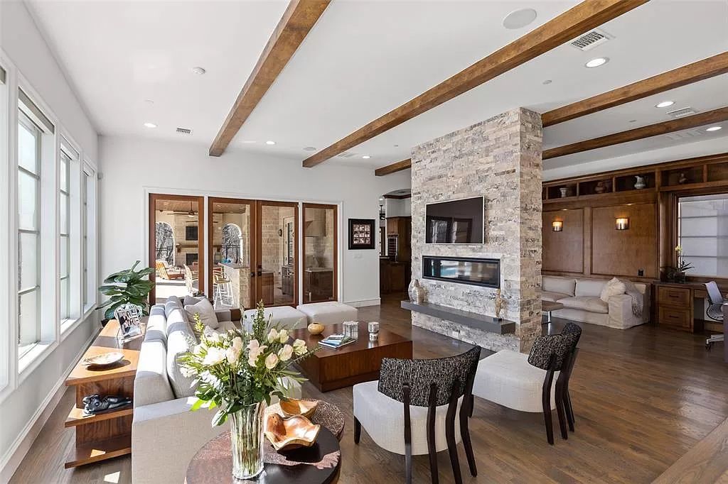 The Home in Allen set on the Twin Creeks Golf Course on a gated community boasts luxurious finishes with exceptional detail now available for sale. This home located at 413 Woodlake Dr, Allen, Texas