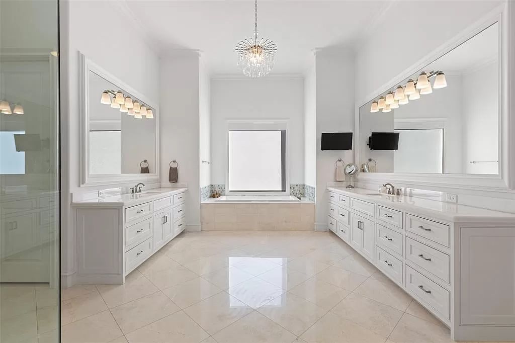 The Home in Allen set on the Twin Creeks Golf Course on a gated community boasts luxurious finishes with exceptional detail now available for sale. This home located at 413 Woodlake Dr, Allen, Texas