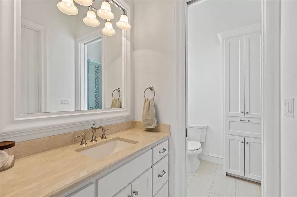 The Home in Allen set on the Twin Creeks Golf Course on a gated community boasts luxurious finishes with exceptional detail now available for sale. This home located at 413 Woodlake Dr, Allen, Texas