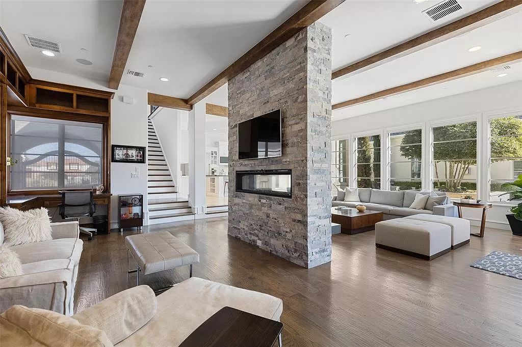 The Home in Allen set on the Twin Creeks Golf Course on a gated community boasts luxurious finishes with exceptional detail now available for sale. This home located at 413 Woodlake Dr, Allen, Texas