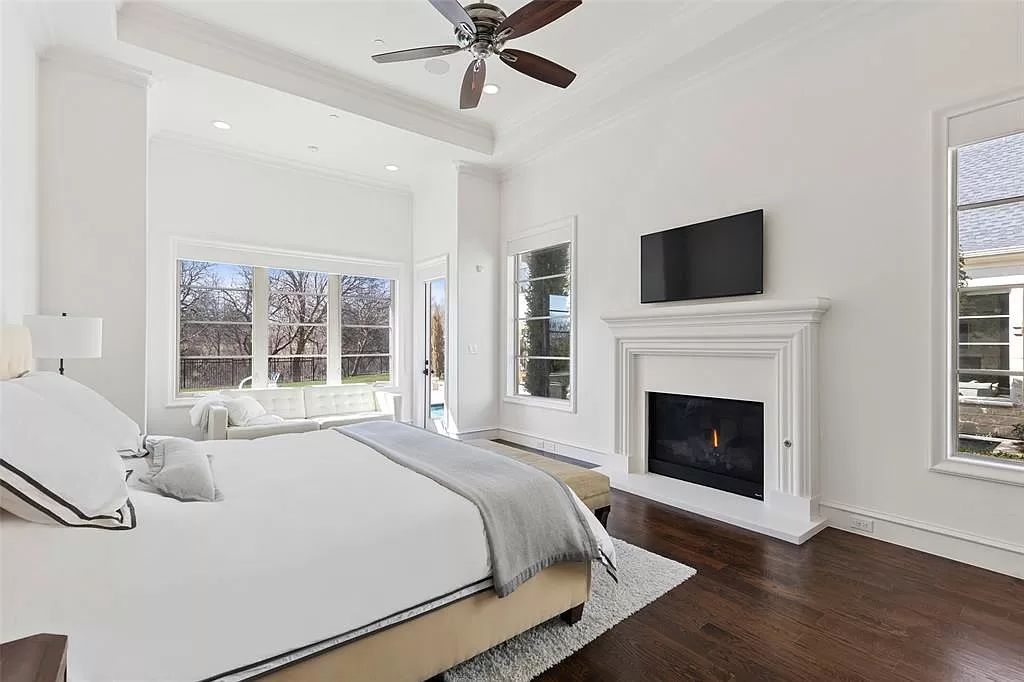 The Home in Allen set on the Twin Creeks Golf Course on a gated community boasts luxurious finishes with exceptional detail now available for sale. This home located at 413 Woodlake Dr, Allen, Texas