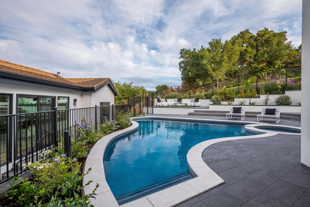 The Home in Woodside is an exceptional residence midway between San Francisco and Silicon Valley now available for sale. This home located at 333 Raymundo Dr, Woodside, California