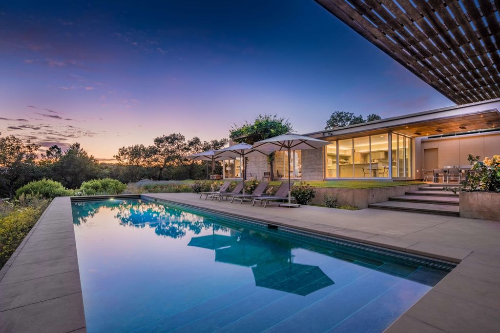 The Home in Sonoma is an architecturally significant estate with vineyard creates a harmonious convergence of nature now available for sale. This house located at 1861 Hale Rd, Sonoma, California