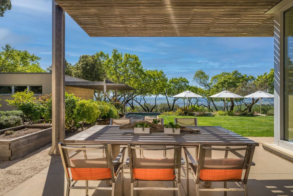 The Home in Sonoma is an architecturally significant estate with vineyard creates a harmonious convergence of nature now available for sale. This house located at 1861 Hale Rd, Sonoma, California