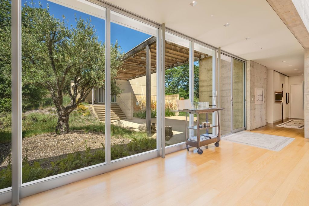 The Home in Sonoma is an architecturally significant estate with vineyard creates a harmonious convergence of nature now available for sale. This house located at 1861 Hale Rd, Sonoma, California