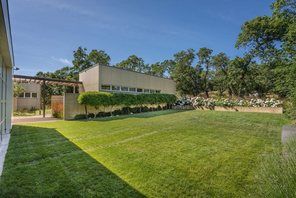 The Home in Sonoma is an architecturally significant estate with vineyard creates a harmonious convergence of nature now available for sale. This house located at 1861 Hale Rd, Sonoma, California