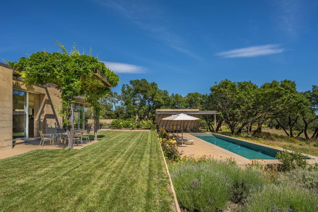 The Home in Sonoma is an architecturally significant estate with vineyard creates a harmonious convergence of nature now available for sale. This house located at 1861 Hale Rd, Sonoma, California
