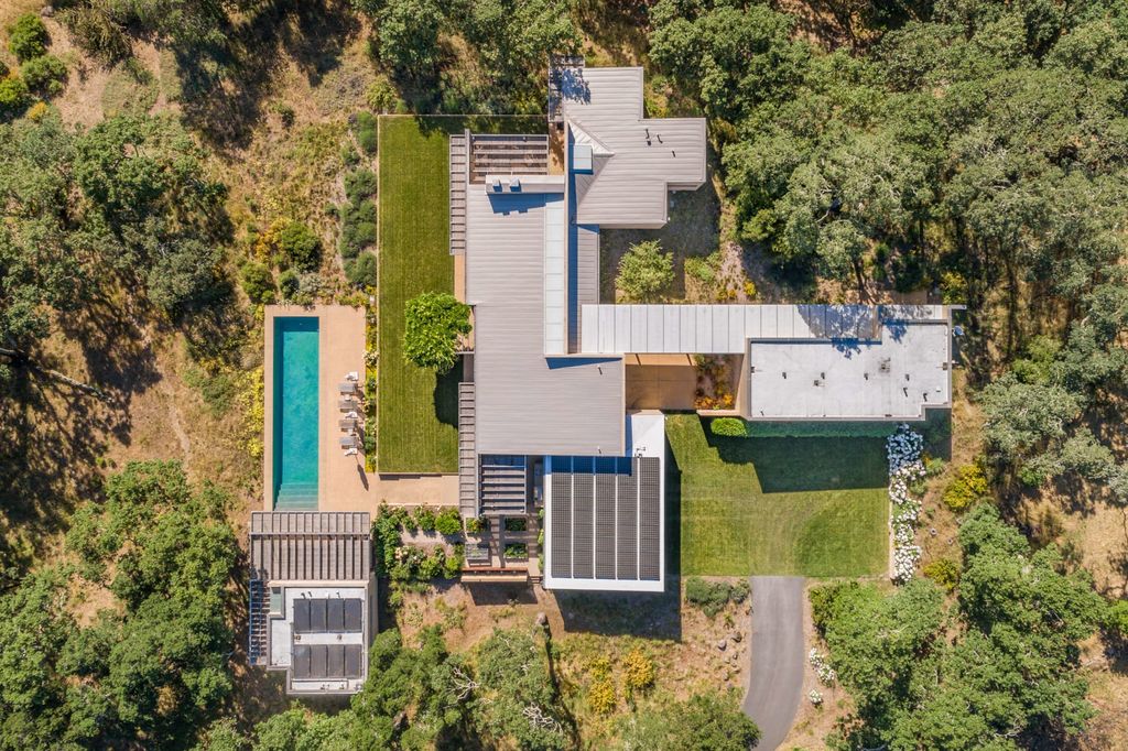 The Home in Sonoma is an architecturally significant estate with vineyard creates a harmonious convergence of nature now available for sale. This house located at 1861 Hale Rd, Sonoma, California
