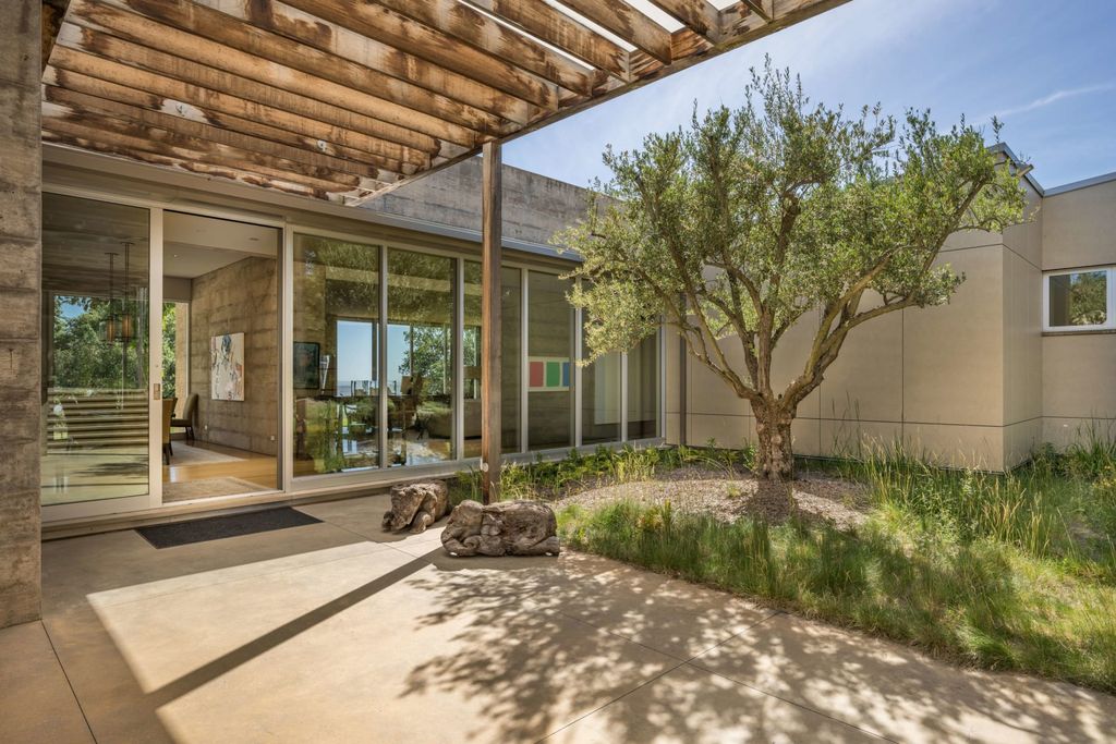 The Home in Sonoma is an architecturally significant estate with vineyard creates a harmonious convergence of nature now available for sale. This house located at 1861 Hale Rd, Sonoma, California