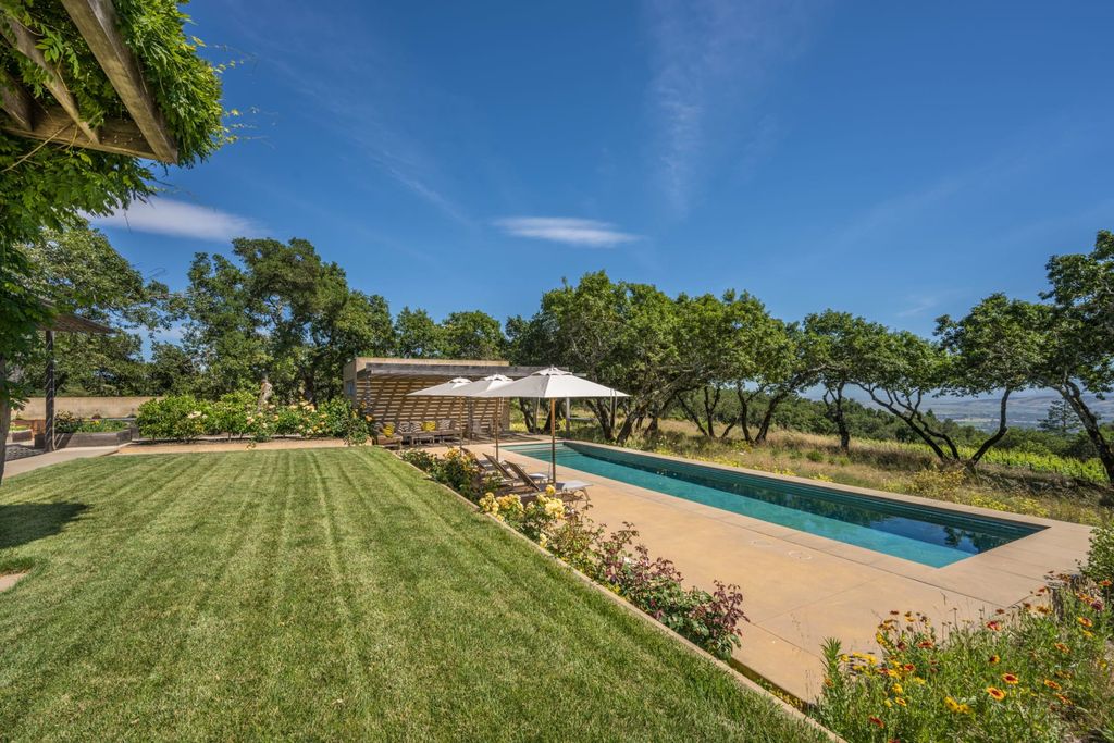 The Home in Sonoma is an architecturally significant estate with vineyard creates a harmonious convergence of nature now available for sale. This house located at 1861 Hale Rd, Sonoma, California