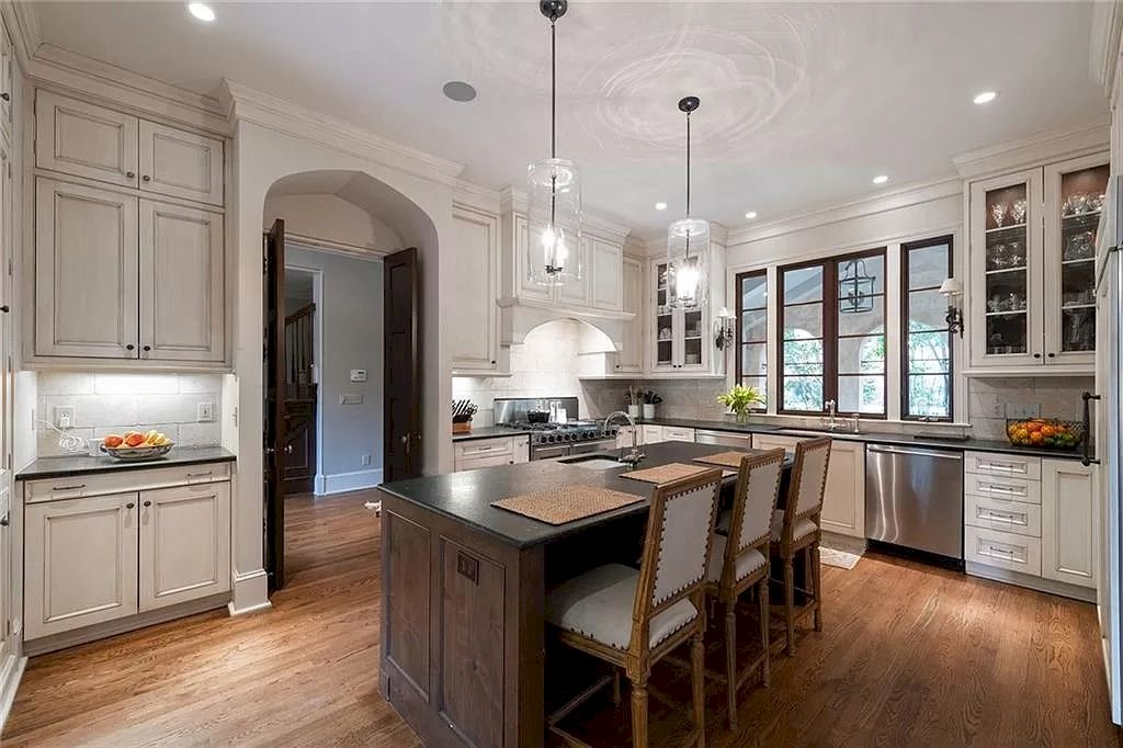 The Home in Georgia is a luxurious home extensively renovated to showcase high ceilings, beautiful hardwoods, gracious rooms and so much more appeal now available for sale. This home located at 2943 Habersham Rd NW, Atlanta, Georgia; offering 05 bedrooms and 06 bathrooms with 7,613 square feet of living spaces.