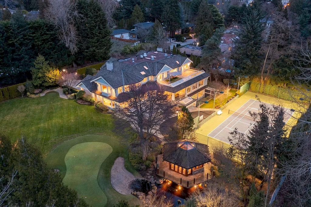The House in Vancouver has exceptionally landscaped outdoor grounds feature a full size tennis court, a mini golf putting green, a Japanese Zen garden, now available for sale