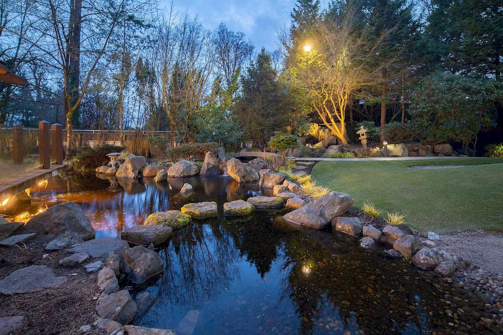 The House in Vancouver has exceptionally landscaped outdoor grounds feature a full size tennis court, a mini golf putting green, a Japanese Zen garden, now available for sale