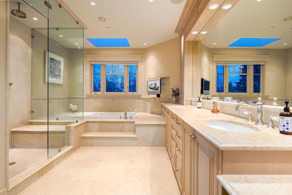 The House in Vancouver has exceptionally landscaped outdoor grounds feature a full size tennis court, a mini golf putting green, a Japanese Zen garden, now available for sale