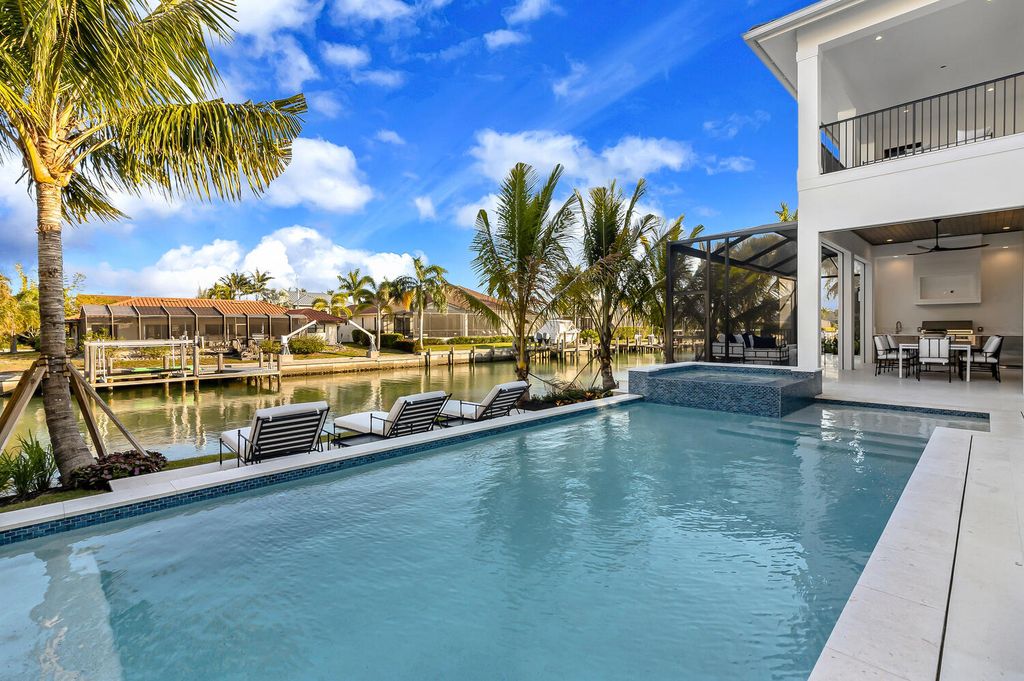 The Home in Marco Island is a perfect sanctuary features exquisite and high end interior finishes throughout now available for sale. This house located at 617 Crescent St, Marco Island, Florida