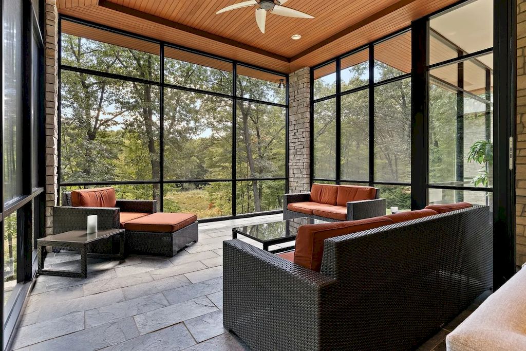 The Home in Michigan is a luxurious home having full stone exterior now available for sale. This home located at 6956 Cooley Lake Rd, White Lake, Michigan; offering 05 bedrooms and 05 bathrooms with 7,153 square feet of living spaces.