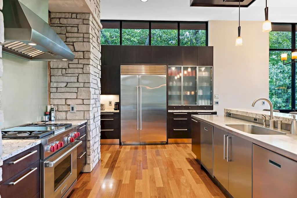 The Home in Michigan is a luxurious home having full stone exterior now available for sale. This home located at 6956 Cooley Lake Rd, White Lake, Michigan; offering 05 bedrooms and 05 bathrooms with 7,153 square feet of living spaces.