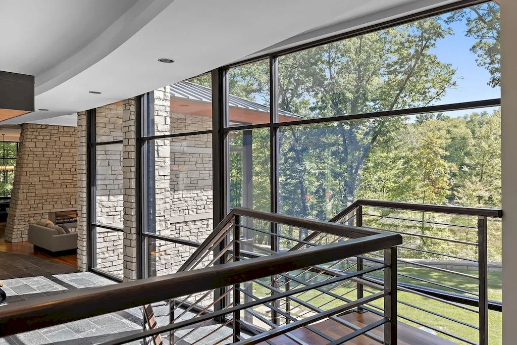 The Home in Michigan is a luxurious home having full stone exterior now available for sale. This home located at 6956 Cooley Lake Rd, White Lake, Michigan; offering 05 bedrooms and 05 bathrooms with 7,153 square feet of living spaces.