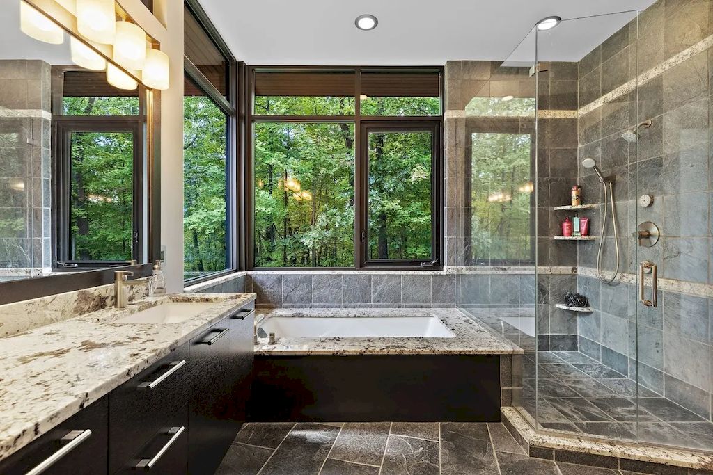 The Home in Michigan is a luxurious home having full stone exterior now available for sale. This home located at 6956 Cooley Lake Rd, White Lake, Michigan; offering 05 bedrooms and 05 bathrooms with 7,153 square feet of living spaces.
