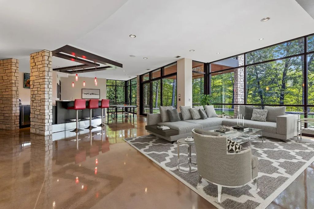 The Home in Michigan is a luxurious home having full stone exterior now available for sale. This home located at 6956 Cooley Lake Rd, White Lake, Michigan; offering 05 bedrooms and 05 bathrooms with 7,153 square feet of living spaces.