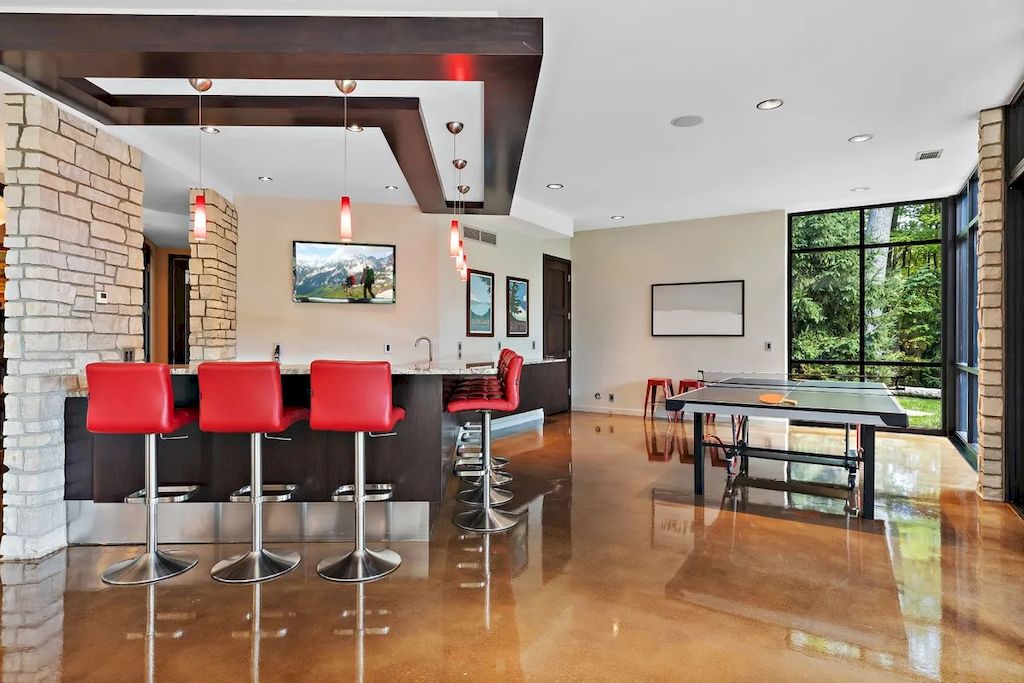 The Home in Michigan is a luxurious home having full stone exterior now available for sale. This home located at 6956 Cooley Lake Rd, White Lake, Michigan; offering 05 bedrooms and 05 bathrooms with 7,153 square feet of living spaces.