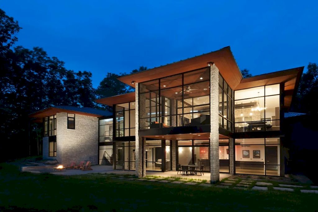 The Home in Michigan is a luxurious home having full stone exterior now available for sale. This home located at 6956 Cooley Lake Rd, White Lake, Michigan; offering 05 bedrooms and 05 bathrooms with 7,153 square feet of living spaces.